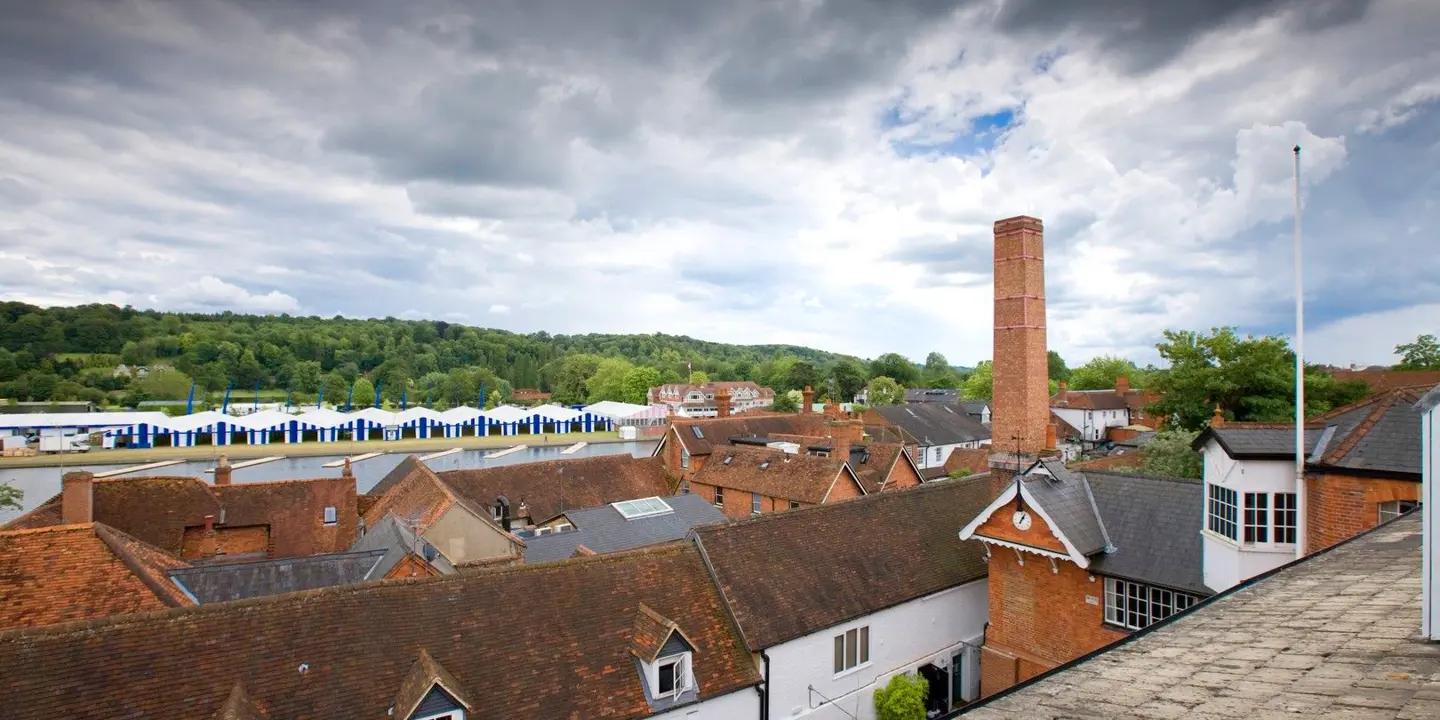 An aerial perspective of a townscape from atop a building.