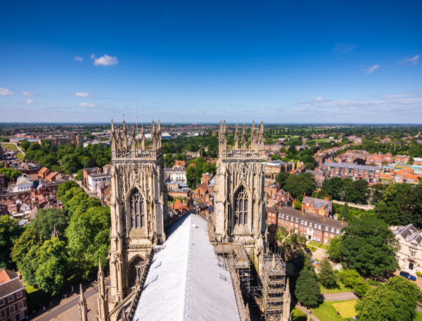 Aerial view of a city featuring a cathedral
