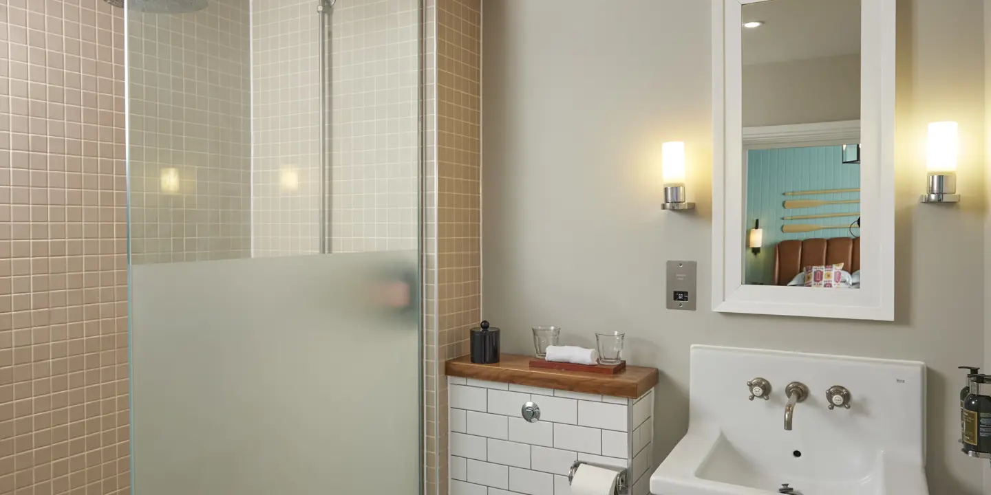 Bathroom featuring a sink and shower.