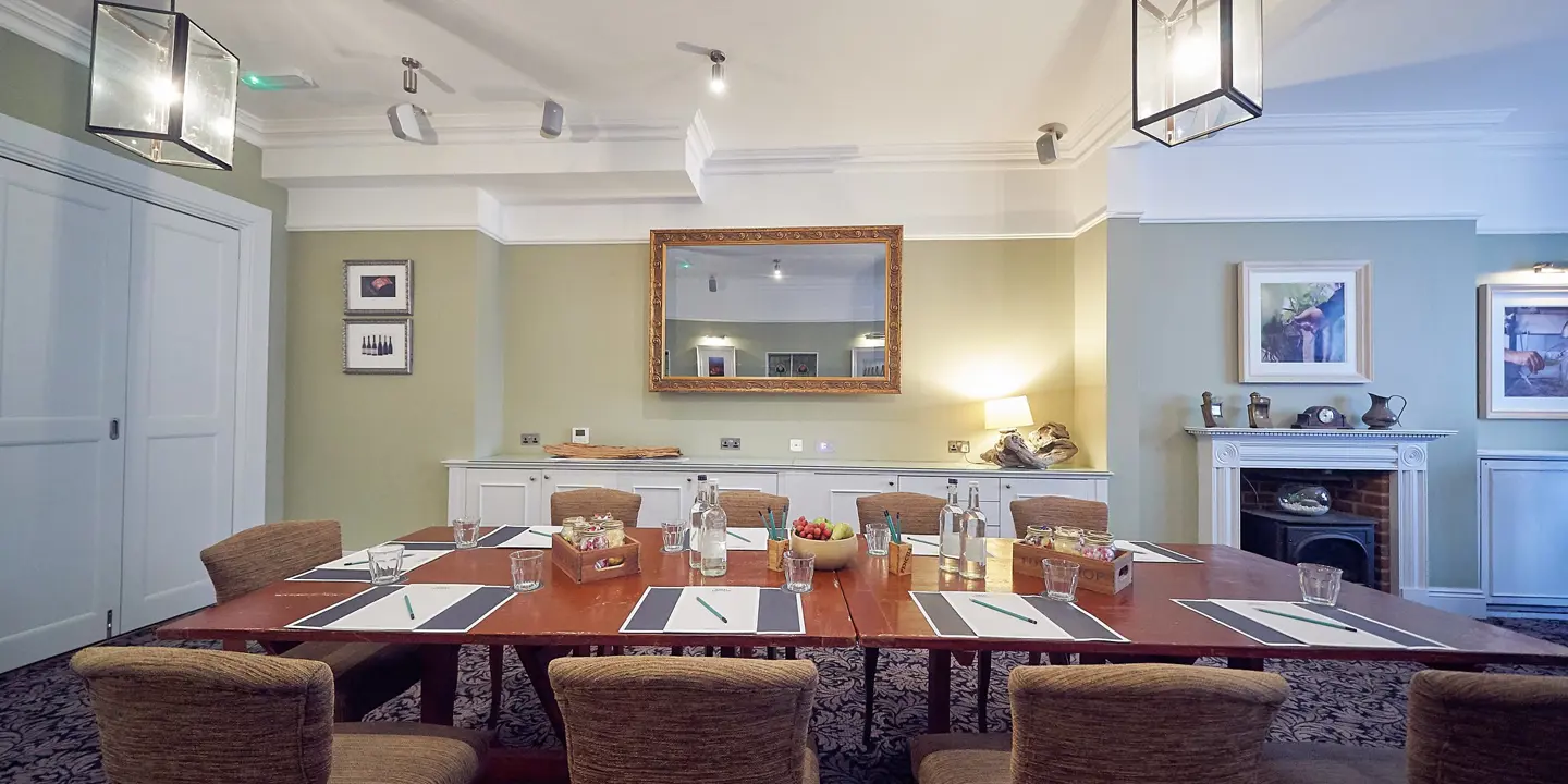 Dining table with neatly arranged place settings