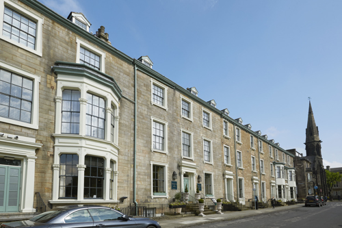 A classic face-brick street view of Harrogate.
