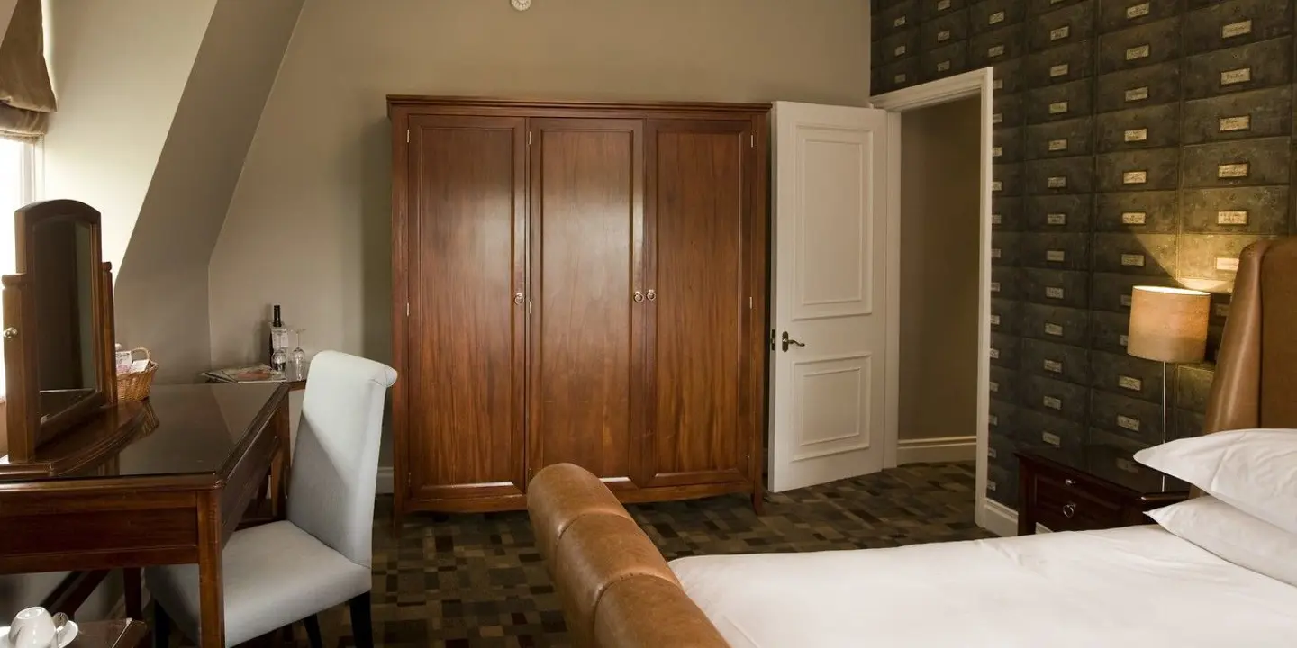 Bedroom featuring a bed and dresser.