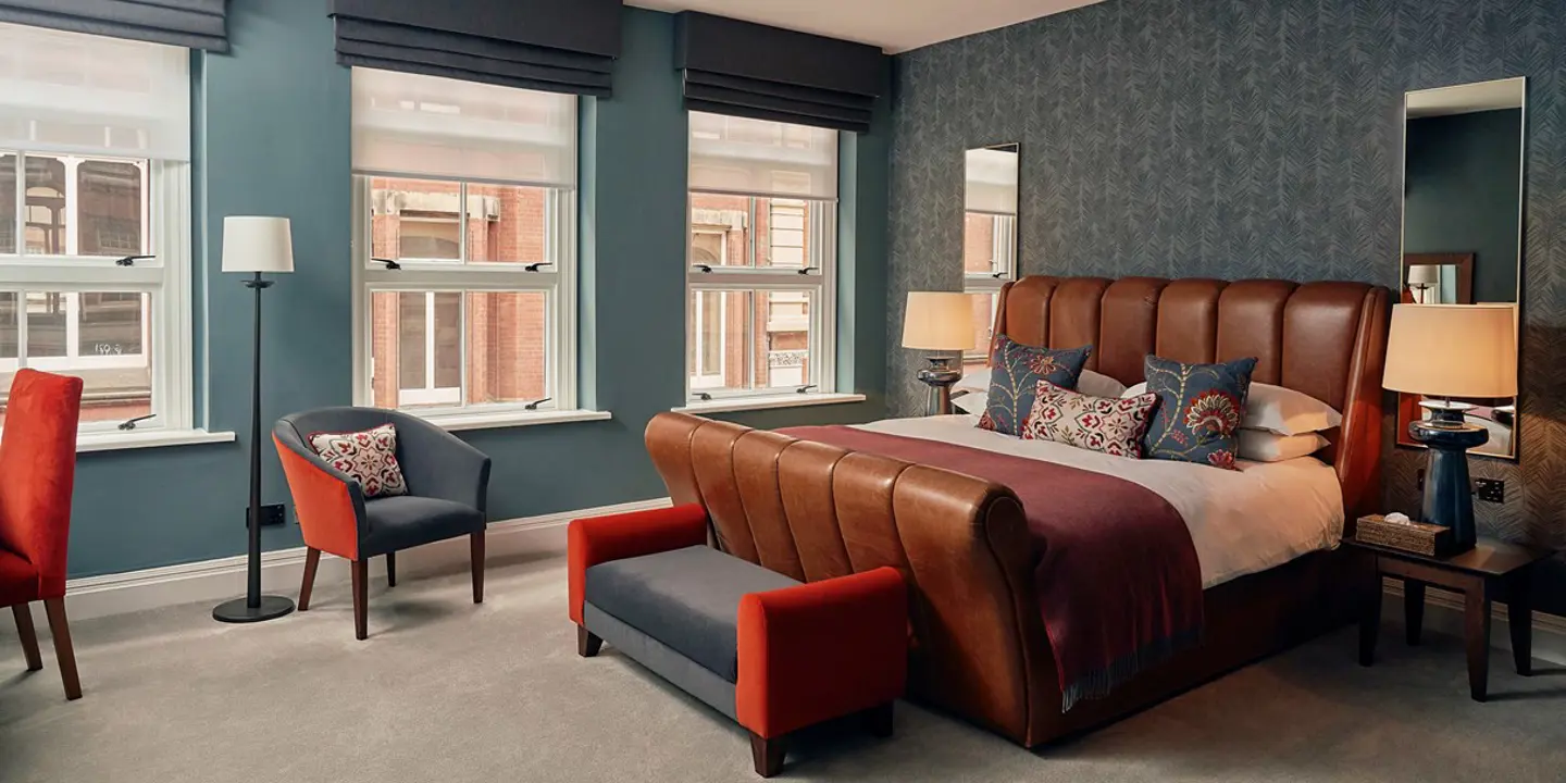 A deluxe room at Malmaison with a super-comfy bed.