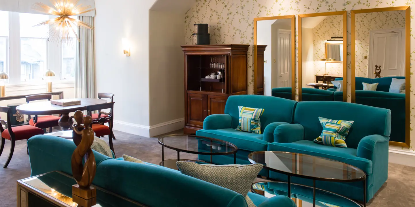 A well-furnished living room with a dining table.