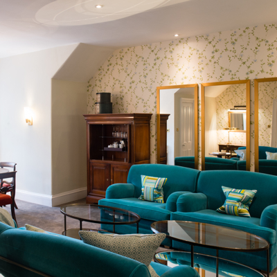 A well-furnished living room with a dining table.