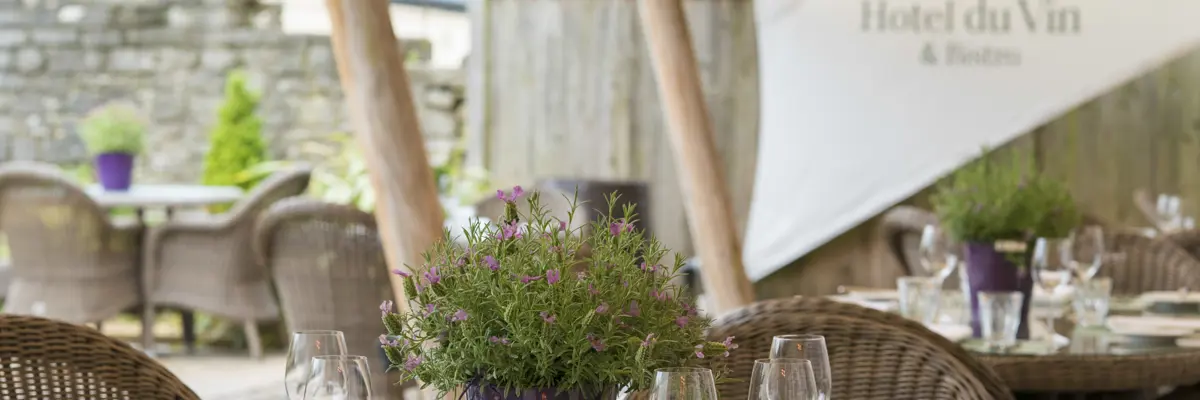 Table under a canopy in a courtyard