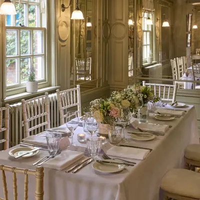 A table adorned with numerous glasses.