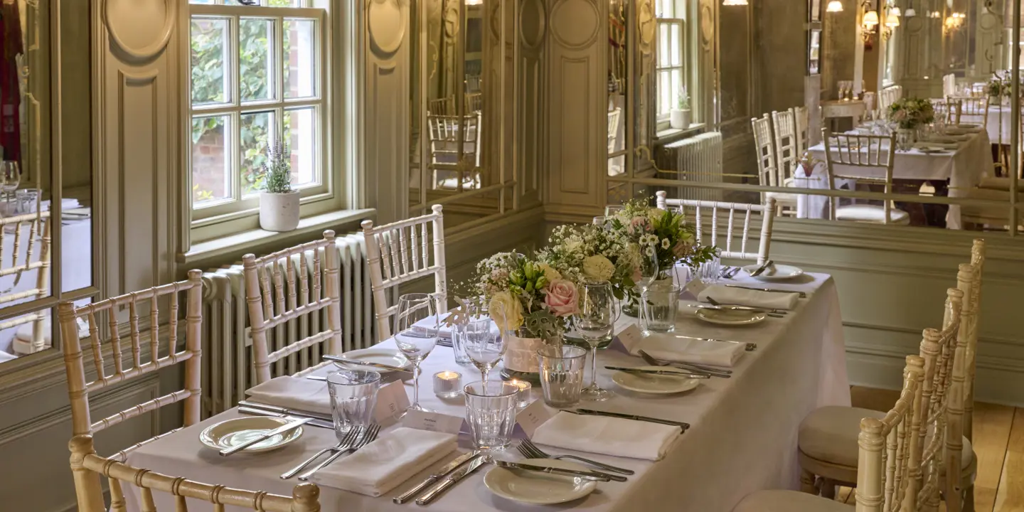 A table adorned with numerous glasses.