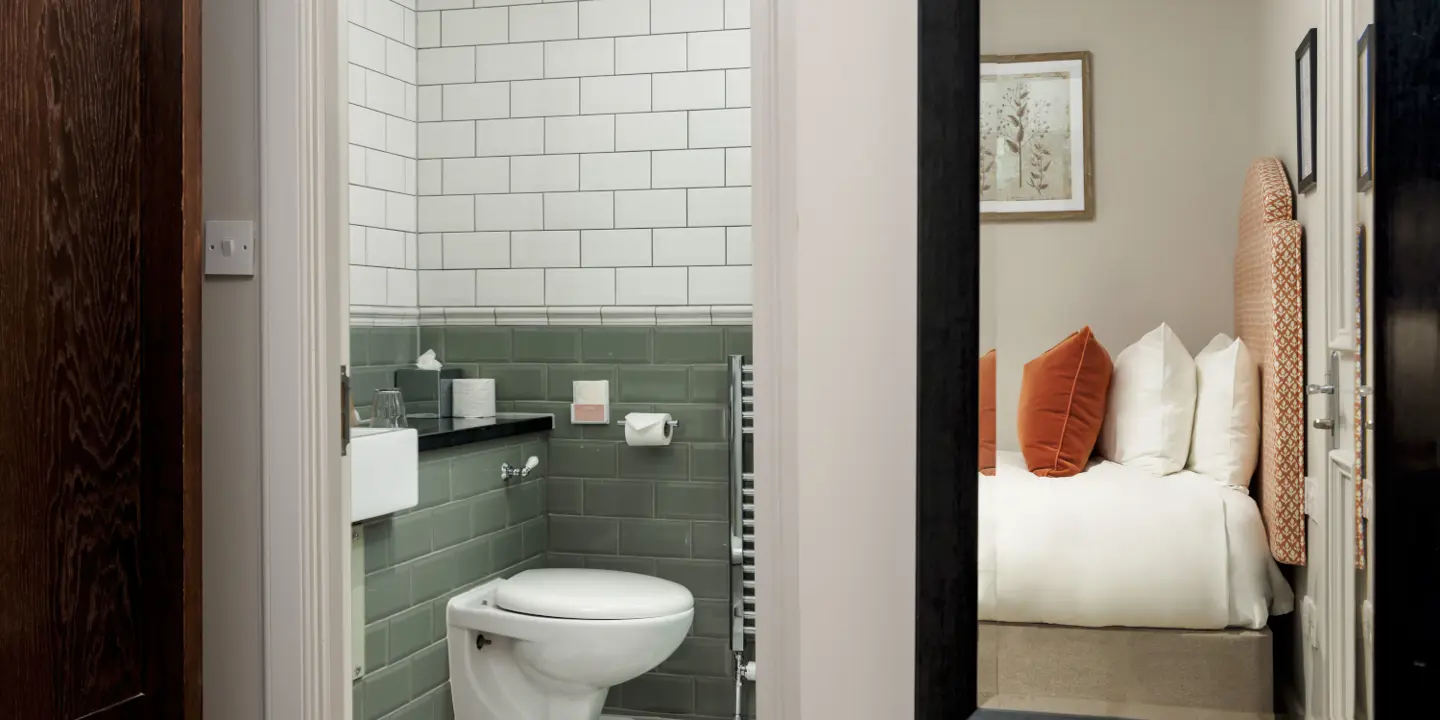 Bathroom featuring a sink and shower.