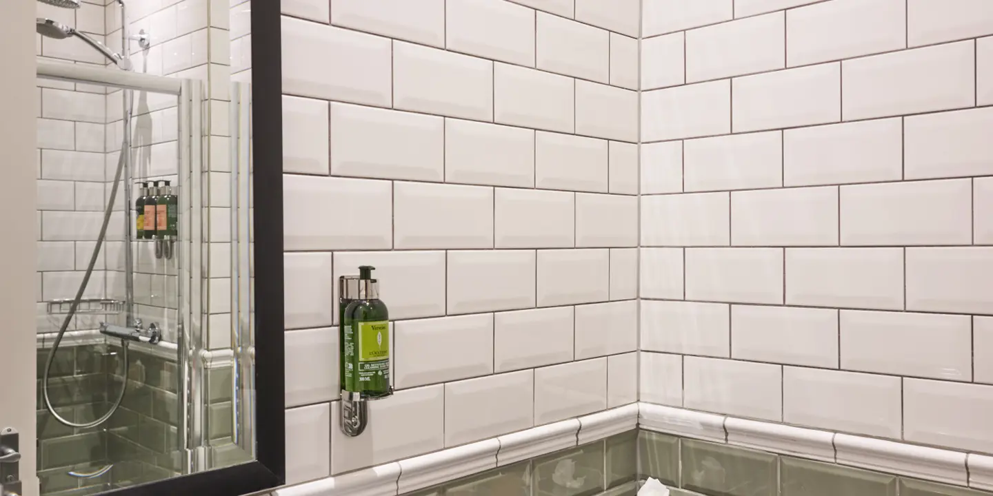 Bathroom featuring a sink and shower.