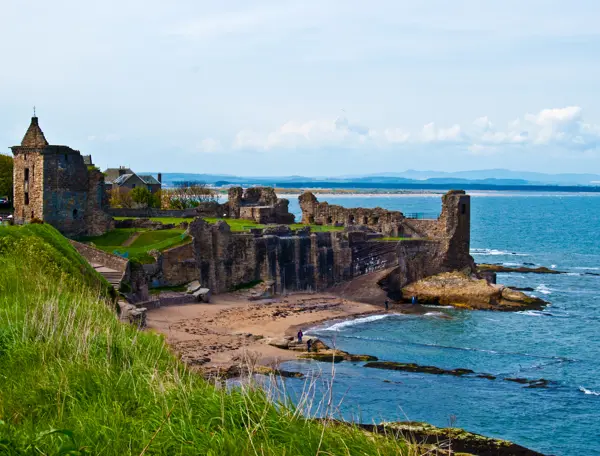 A Cathedral on the edge of a cliff face with sea below.