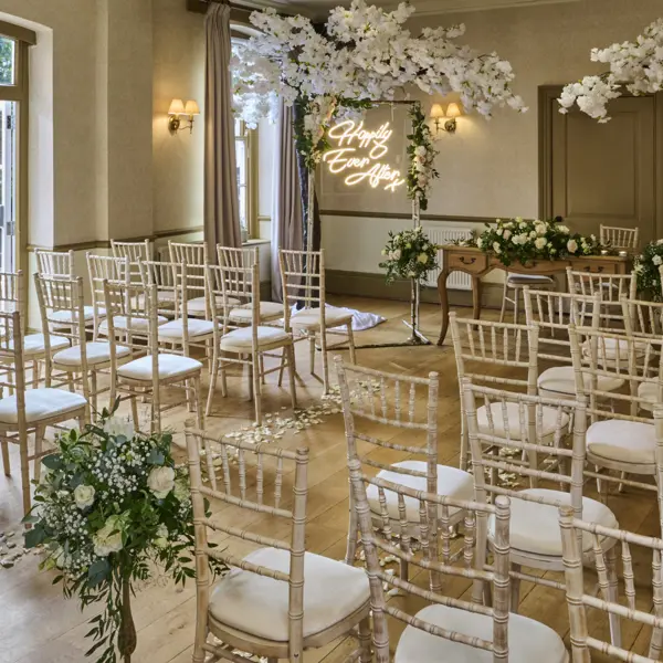 A room filled with numerous chairs and tables.