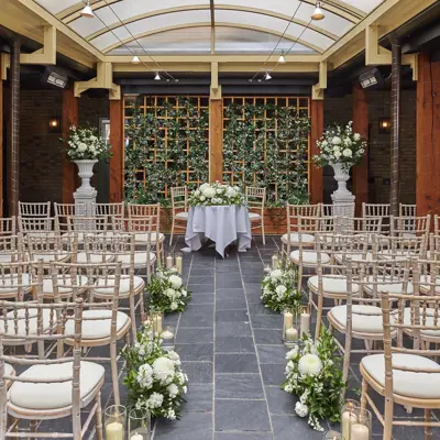 A room filled with numerous chairs and tables.