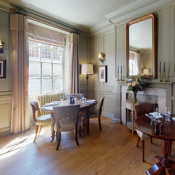 Dining room featuring a table and chairs.