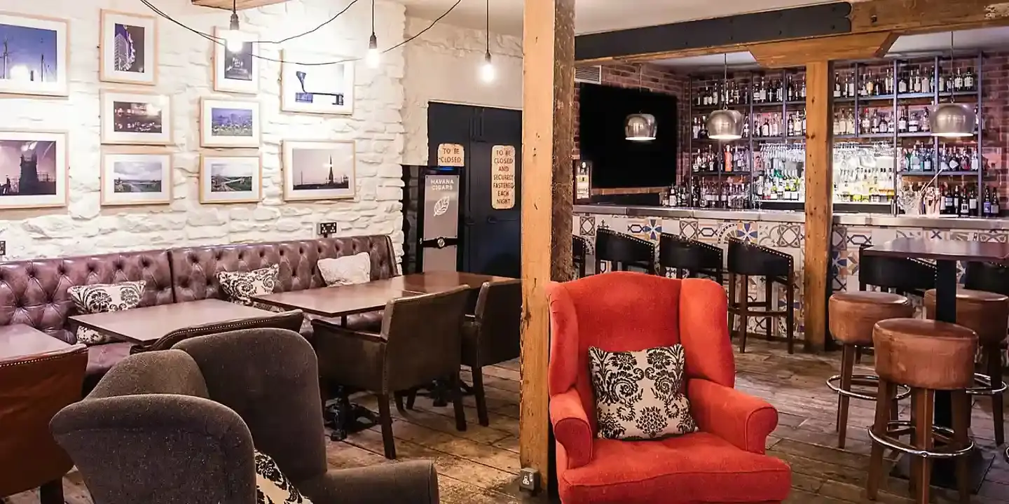 HDV Bristol bar with red armchair